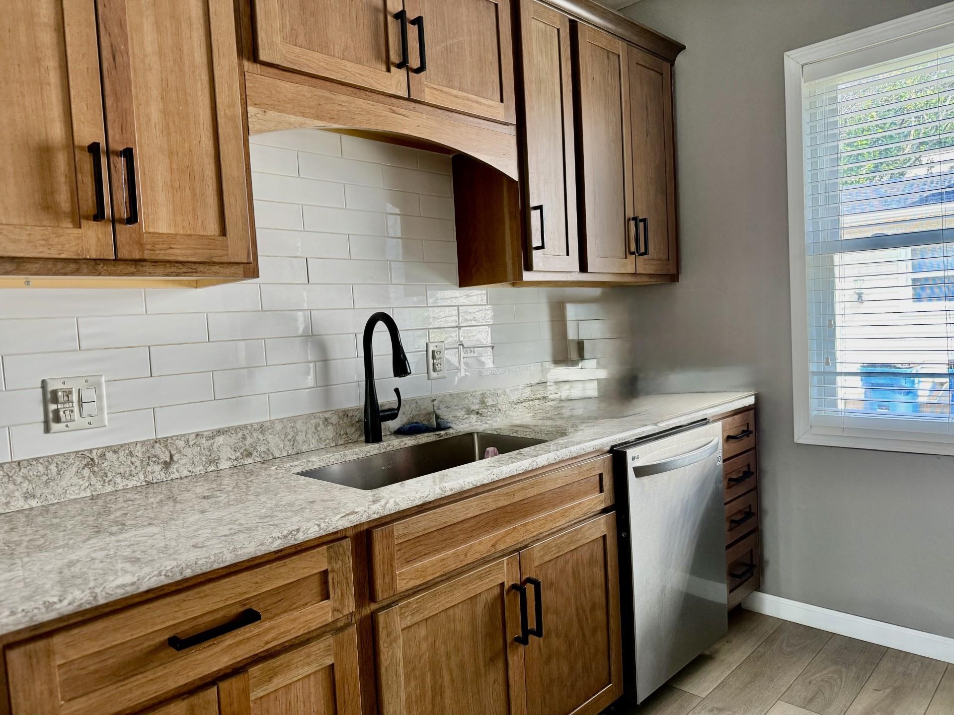 2731 7th Street Peru, IL 61354 - Photo 16 of 25 a kitchen with stainless steel appliances granite countertop a sink and a microwave