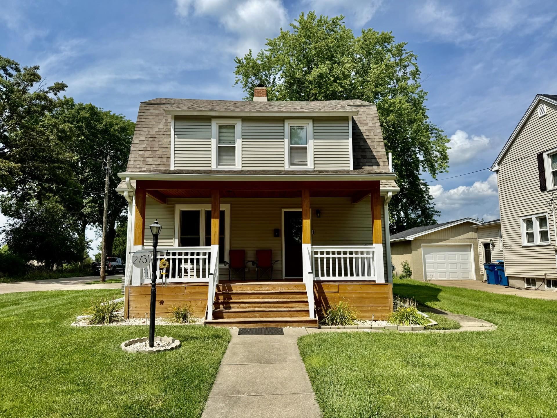 2731 7th Street Peru, IL 61354 - Photo 2 of 25 a front view of a house with a yard