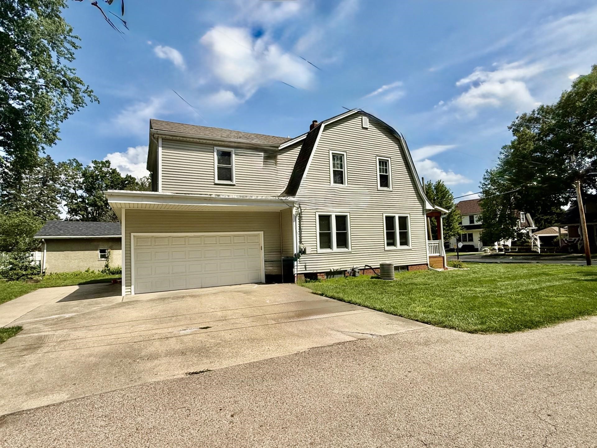 2731 7th Street Peru, IL 61354 - Photo 5 of 25 a view of white house with a big yard and large tree