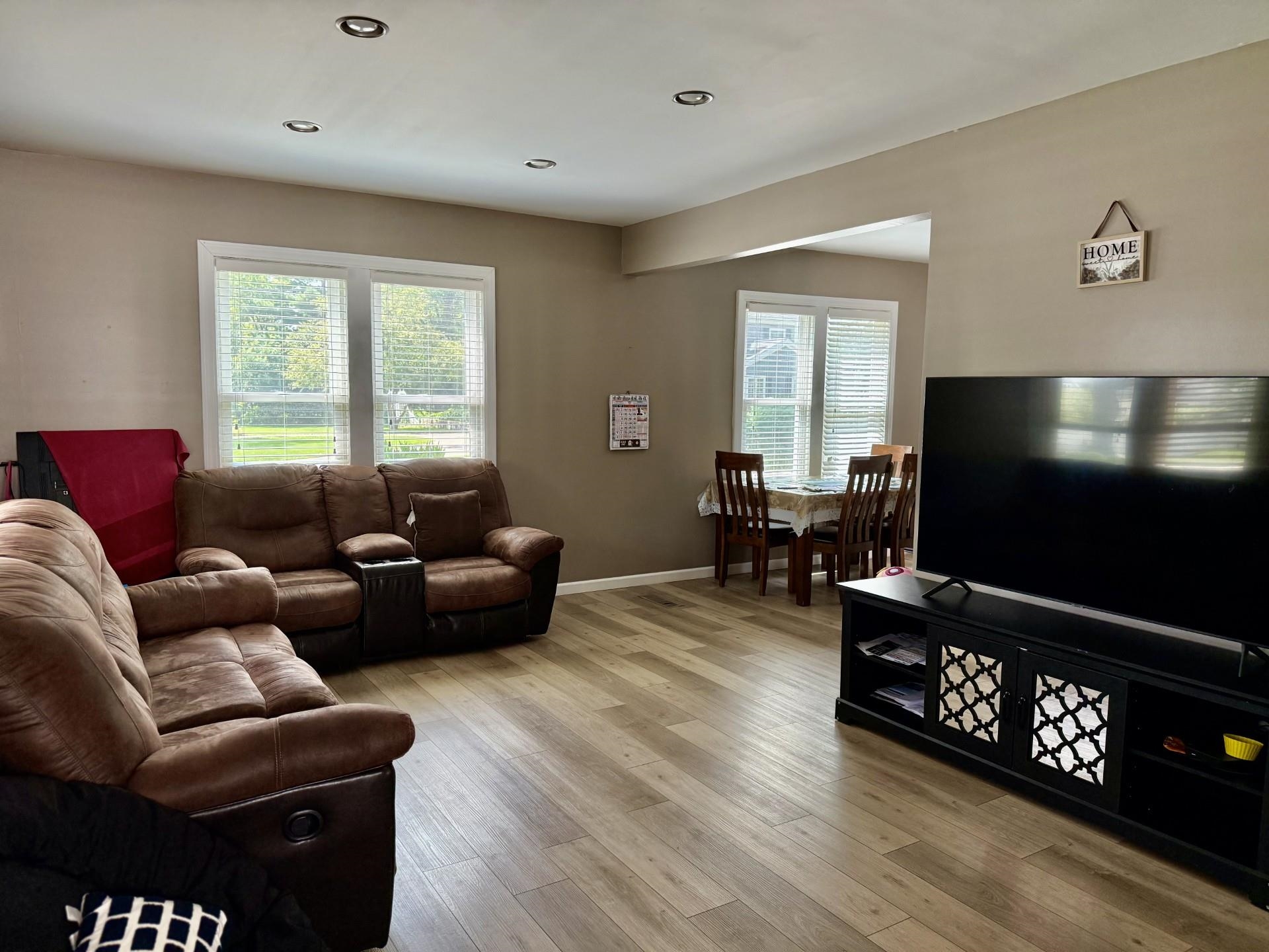 2731 7th Street Peru, IL 61354 - Photo 9 of 25 a living room with furniture and a flat screen tv