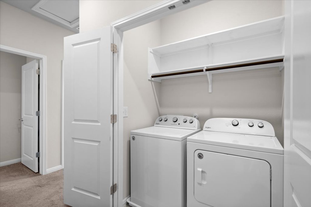9015 Cattle Baron Path, Unit 705 Austin, TX 78747 - Photo 17 of 35 a utility room with dryer and washer