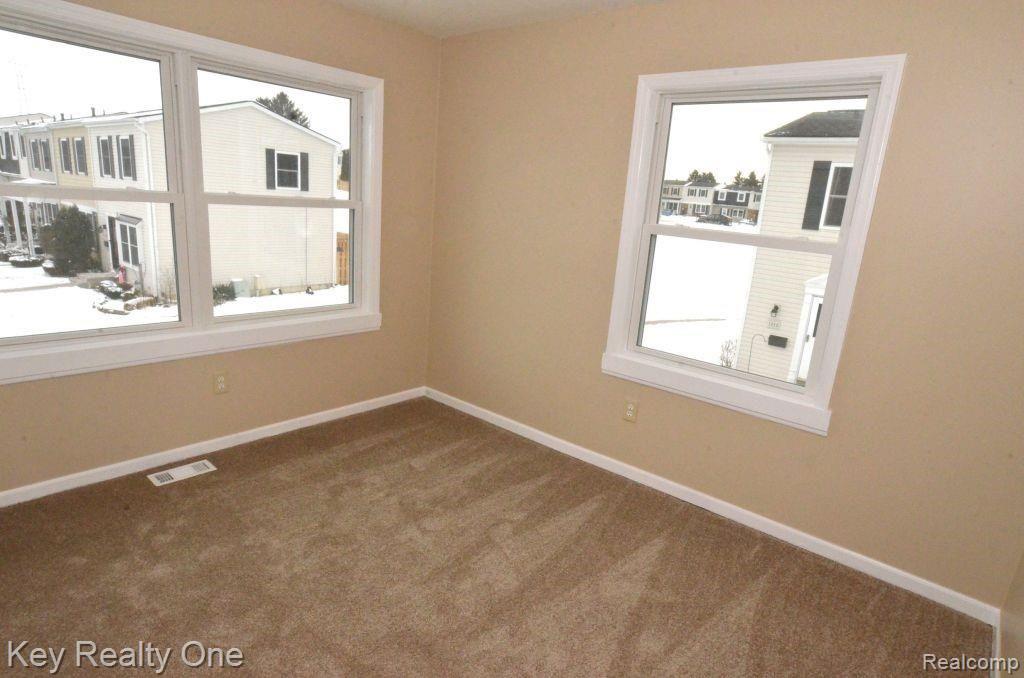 1211 Miniature Court Rochester, MI 48307 - Photo 11 of 12 Brand New Carpet and Paint in the 2nd Bedroom