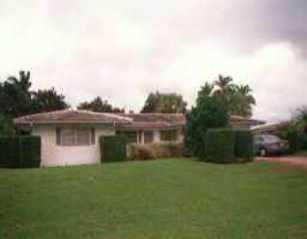 131 Northwest S Shore Road Stuart, FL 34994 - Photo 1 of 1 a front view of house with yard and green space