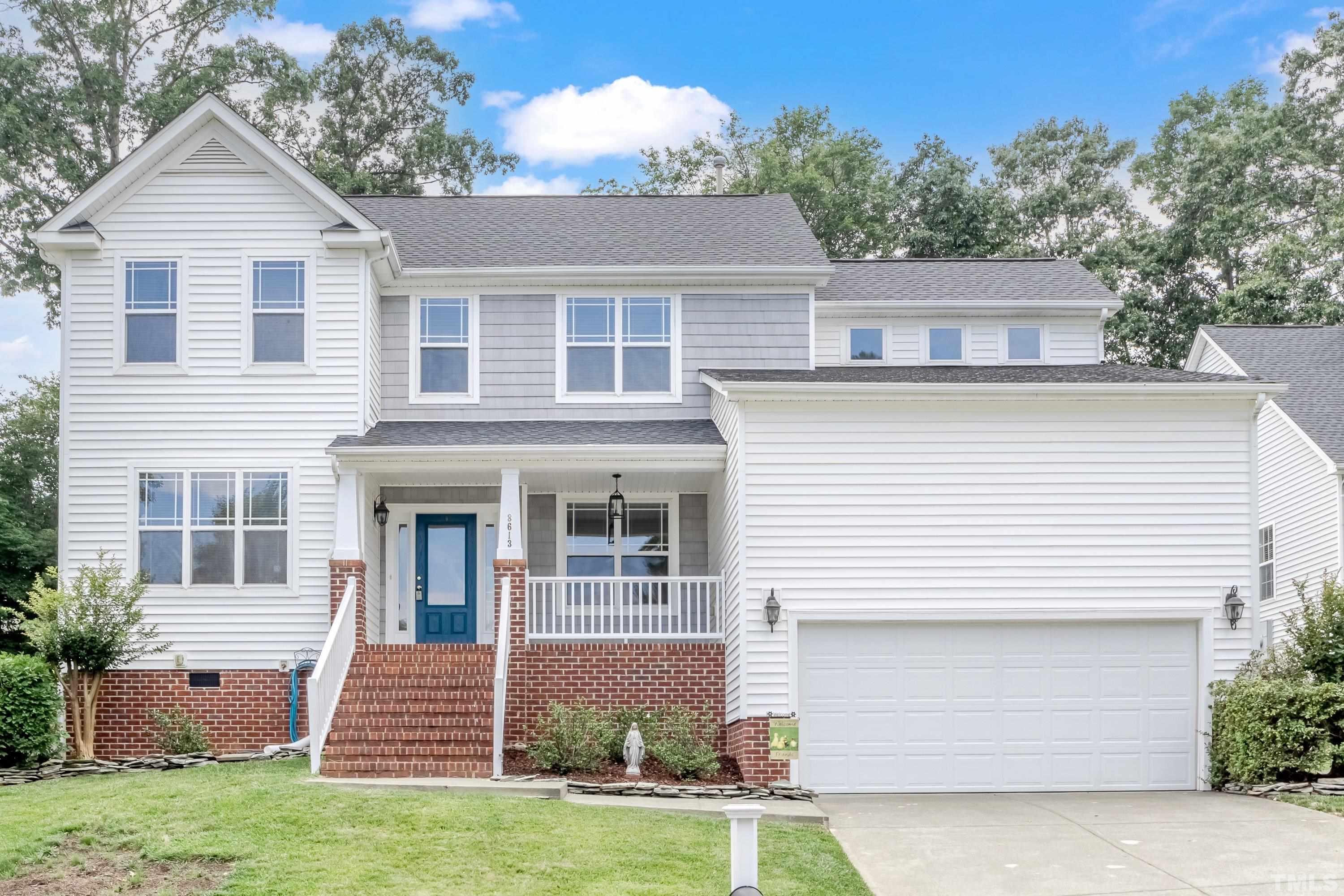 8613 Benzinger Drive Raleigh, NC 27613 - Photo 1 of 48 a view of house with yard