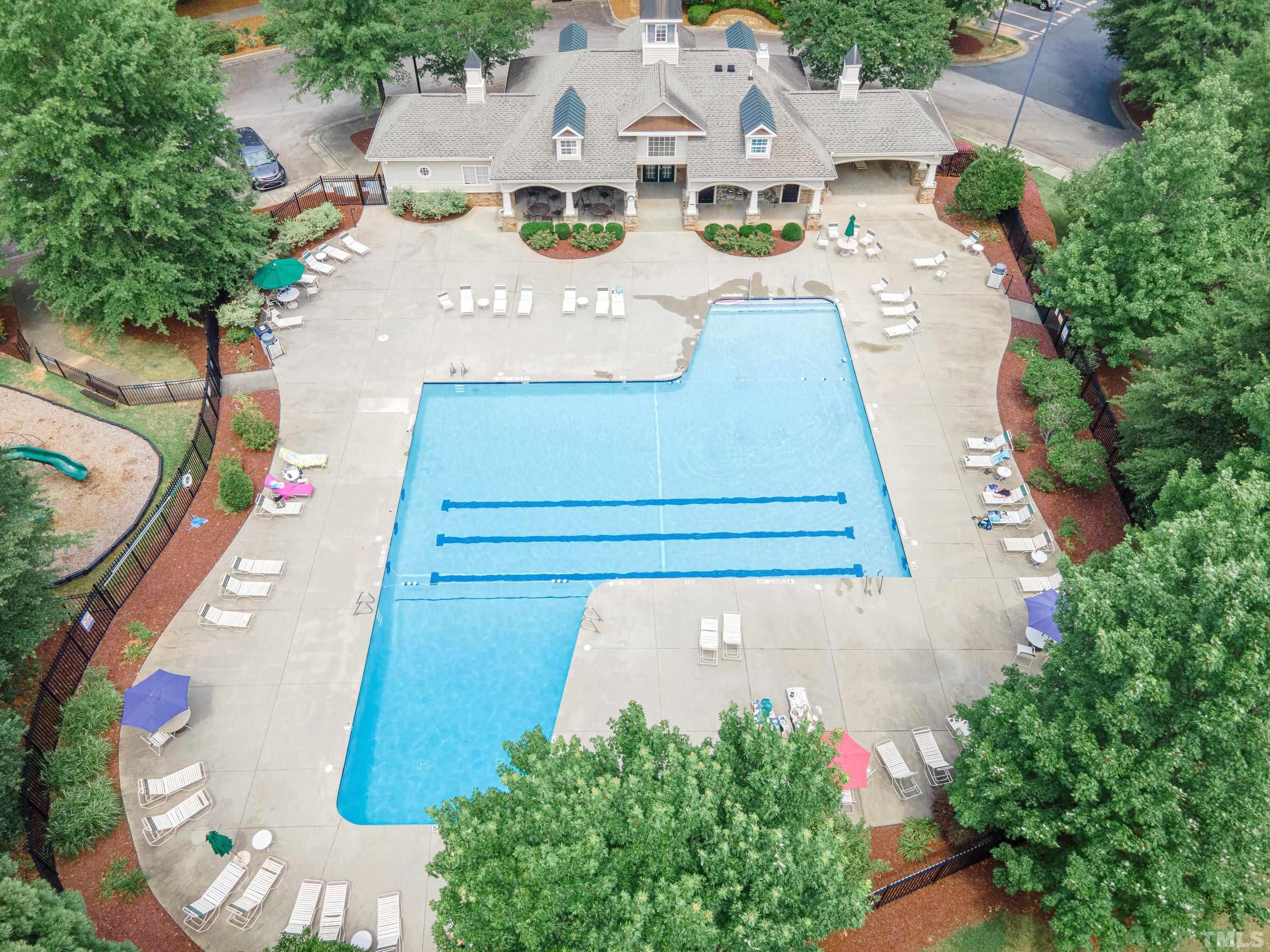 8613 Benzinger Drive Raleigh, NC 27613 - Photo 45 of 48 an aerial view of a house with a yard and garden