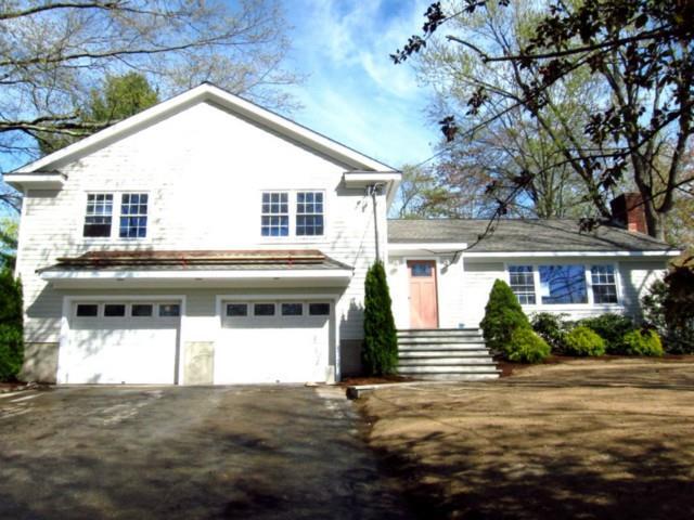 203 Club Road Stamford, CT 06905 - Photo 1 of 1 a front view of a house with garden