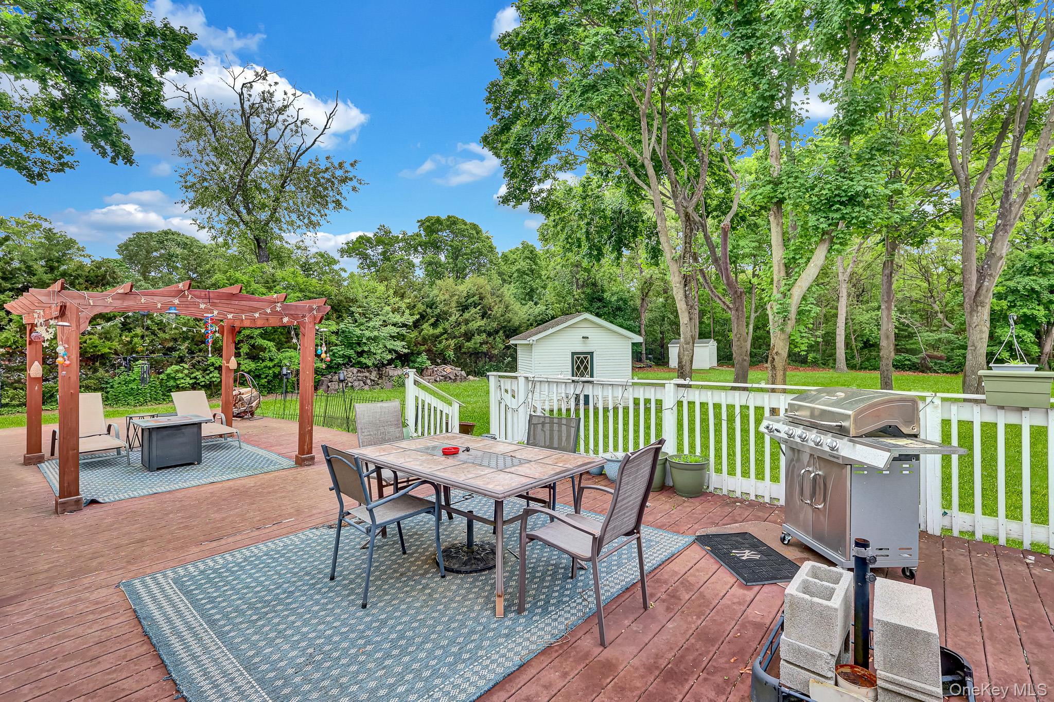 98 Granny Road Farmingville, NY 11738 - Photo 20 of 24 a view of a chairs and table in the patio