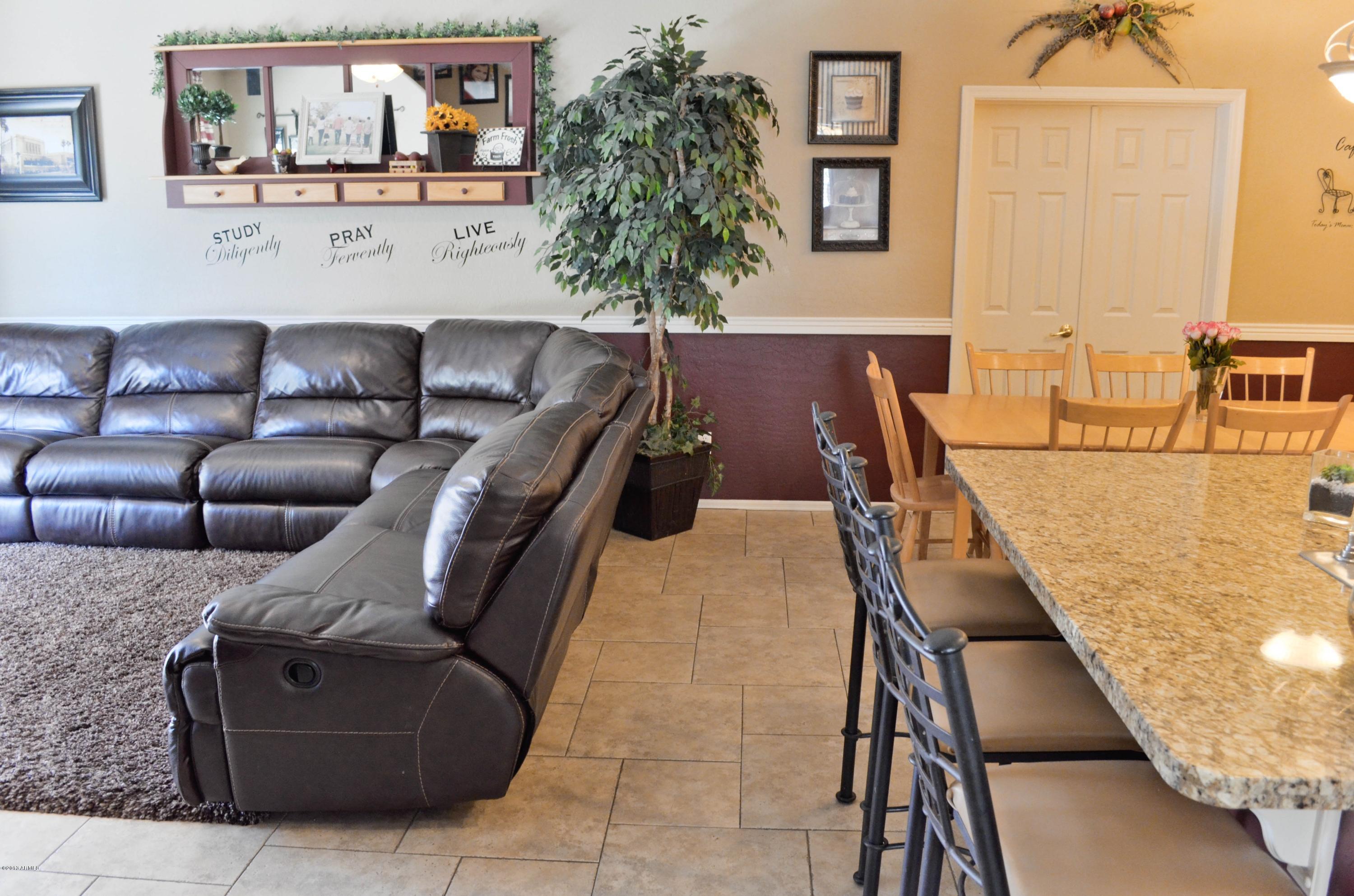 3218 West Sentinel Rock Road Phoenix, AZ 85086 - Photo 10 of 34 Family Room and Breakfast Bar