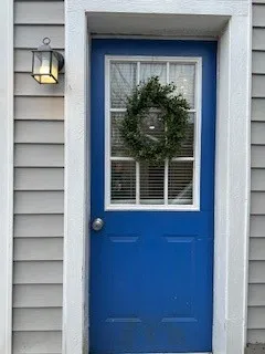 a view of a house with a large window