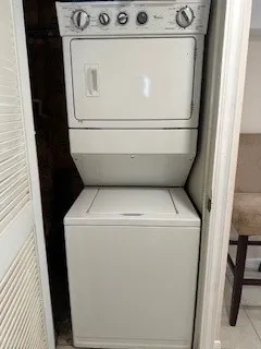 a view of a room that has a window in it