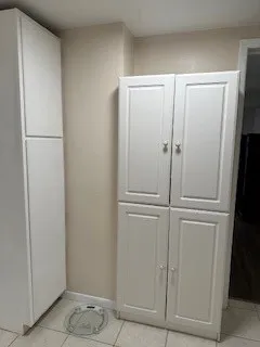 a bathroom with a toilet sink and shower