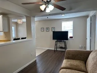 a white refrigerator freezer sitting inside of a kitchen