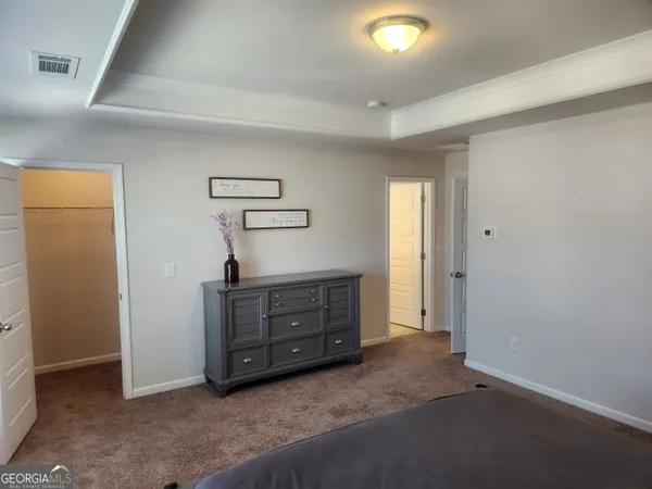 a room with furniture and window