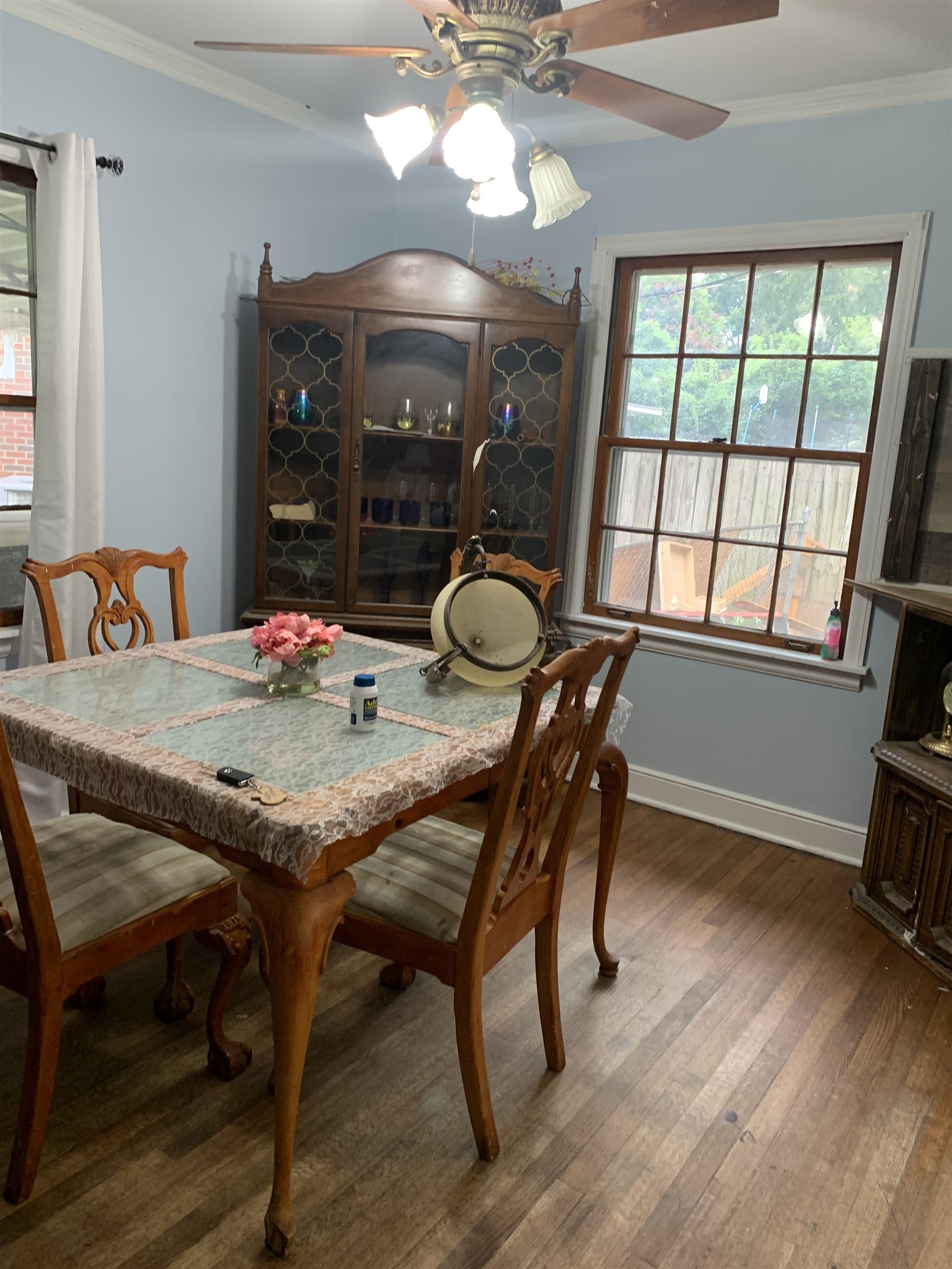4395 Macon Road Memphis, TN 38122 - Photo 6 of 13 Dining space with ornamental molding, ceiling fan, and dark wood-type flooring