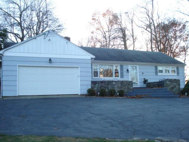 30 Sentinel Hill Road Milford, CT 06460 - Photo 1 of 1 a front view of a house with a yard