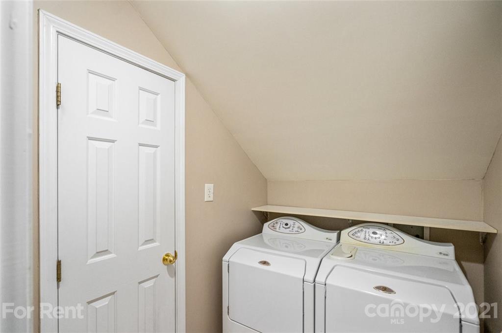 3028 Strawberry Road Matthews, NC 28104 - Photo 20 of 40 a utility room with dryer and washer