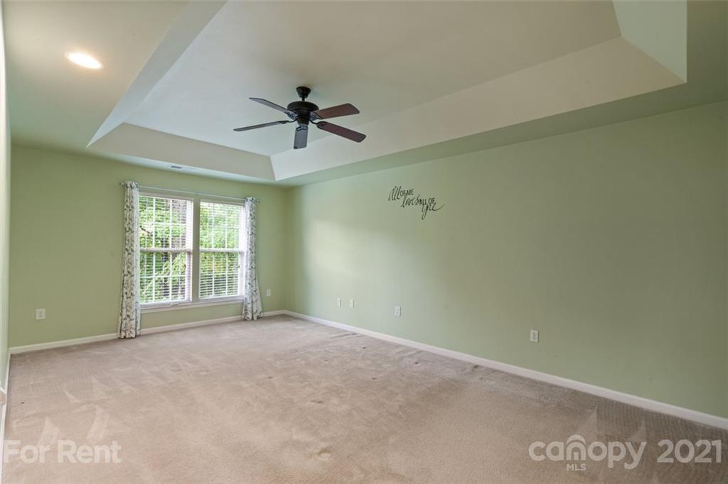 3028 Strawberry Road Matthews, NC 28104 - Photo 28 of 40 a view of an empty room with a window