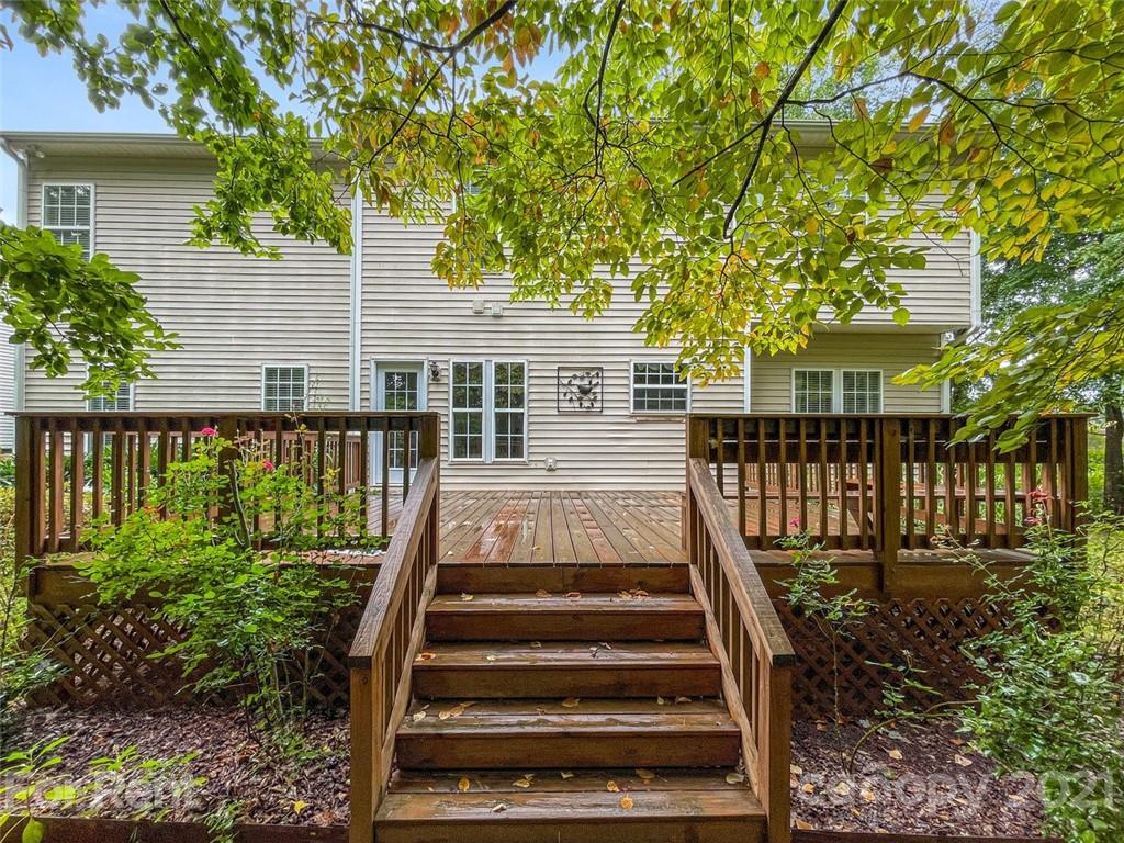 3028 Strawberry Road Matthews, NC 28104 - Photo 39 of 40 a view of a house with backyard and sitting area