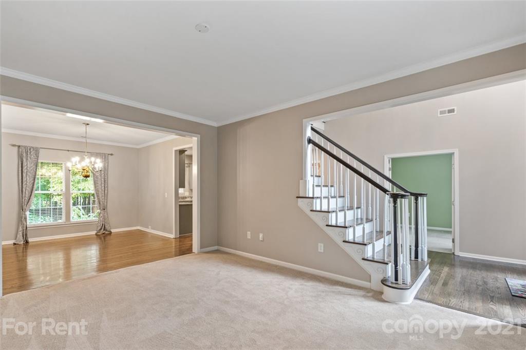 3028 Strawberry Road Matthews, NC 28104 - Photo 6 of 40 a view of an entryway with staircase
