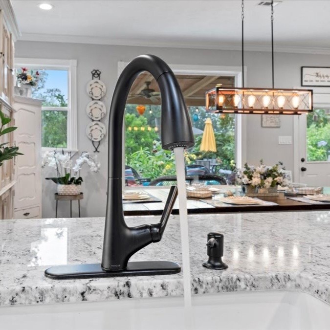 1514 Buchans Drive Spring, TX 77386 - Photo 16 of 50 with a farm sink and granite countertops