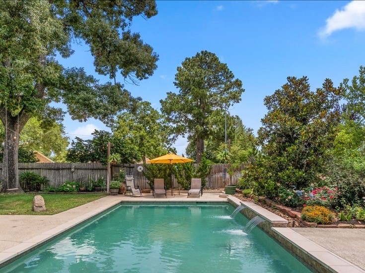 1514 Buchans Drive Spring, TX 77386 - Photo 45 of 50 Surrounding the pool on all sides, you have such a beautiful landscape.