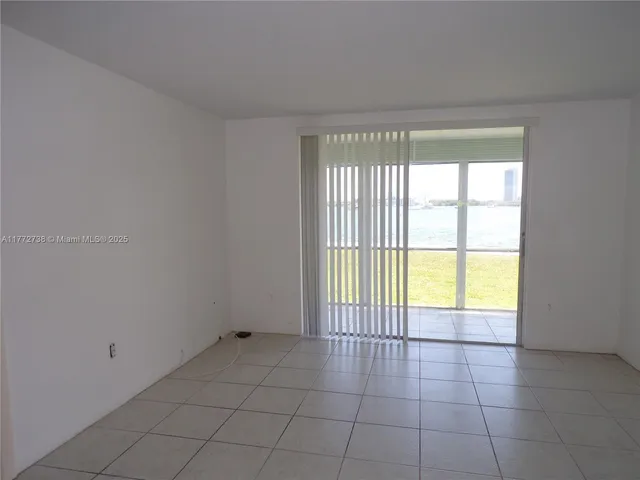 a bathroom with a sink vanity granite toilet tub and shower