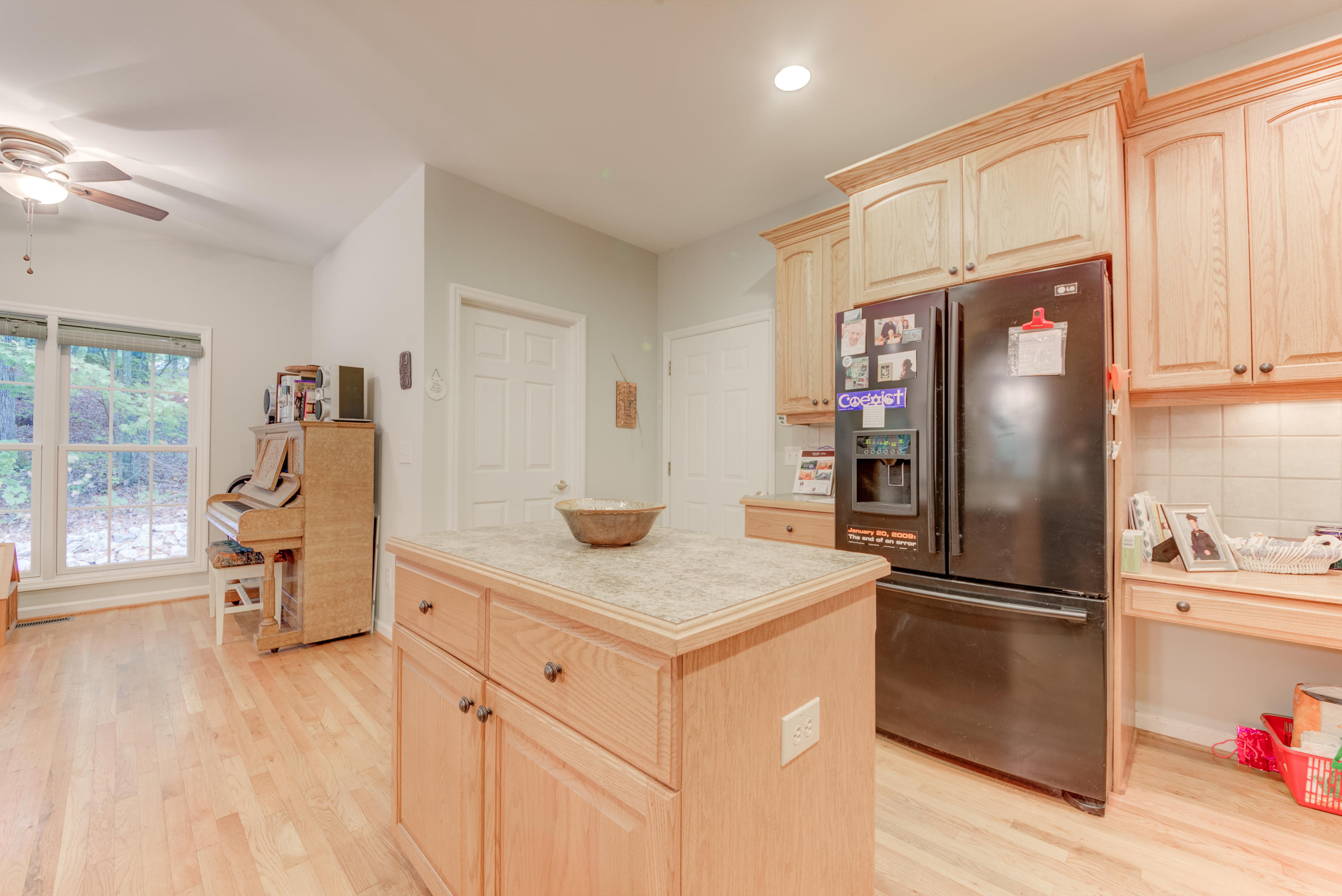 2480 Iron Ridge Road Rocky Mount, VA 24151 - Photo 24 of 38 a kitchen with stainless steel appliances granite countertop a refrigerator and a stove top oven
