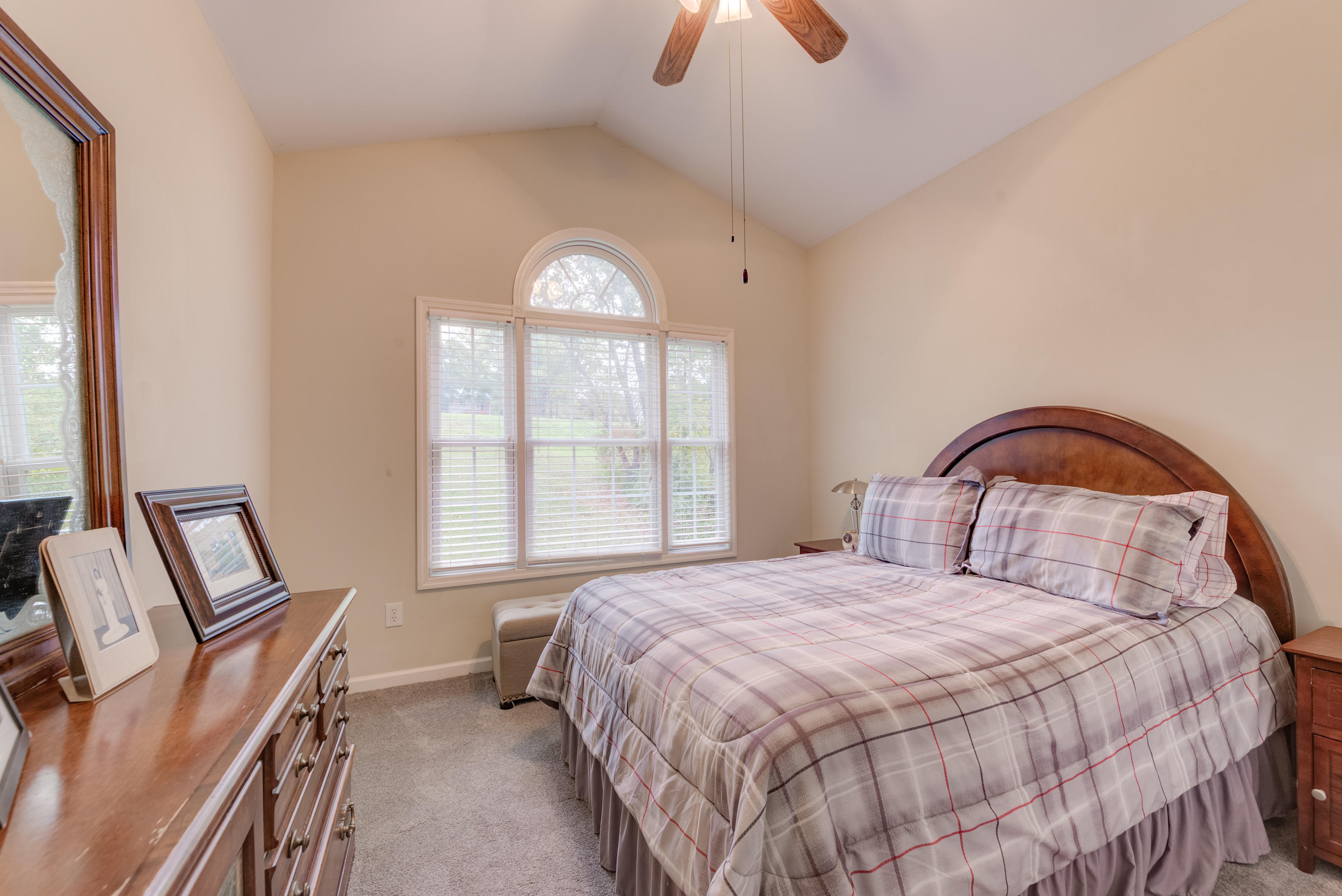 2480 Iron Ridge Road Rocky Mount, VA 24151 - Photo 31 of 38 a bedroom with a bed and a window