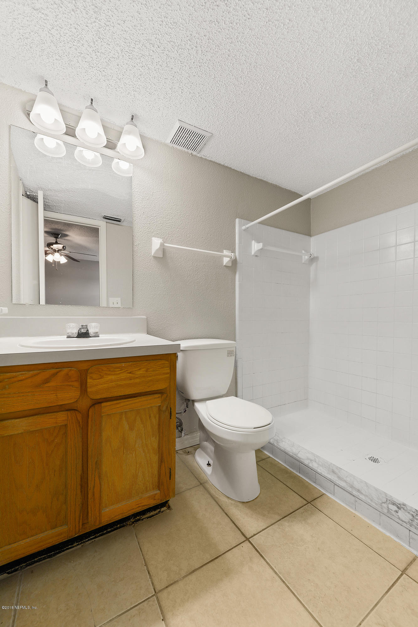 8831 Ivey Road Jacksonville, FL 32216 - Photo 14 of 17 Upstairs Bathroom