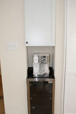 a kitchen with a stove and a microwave