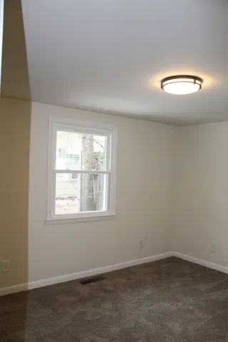 an empty room with a window