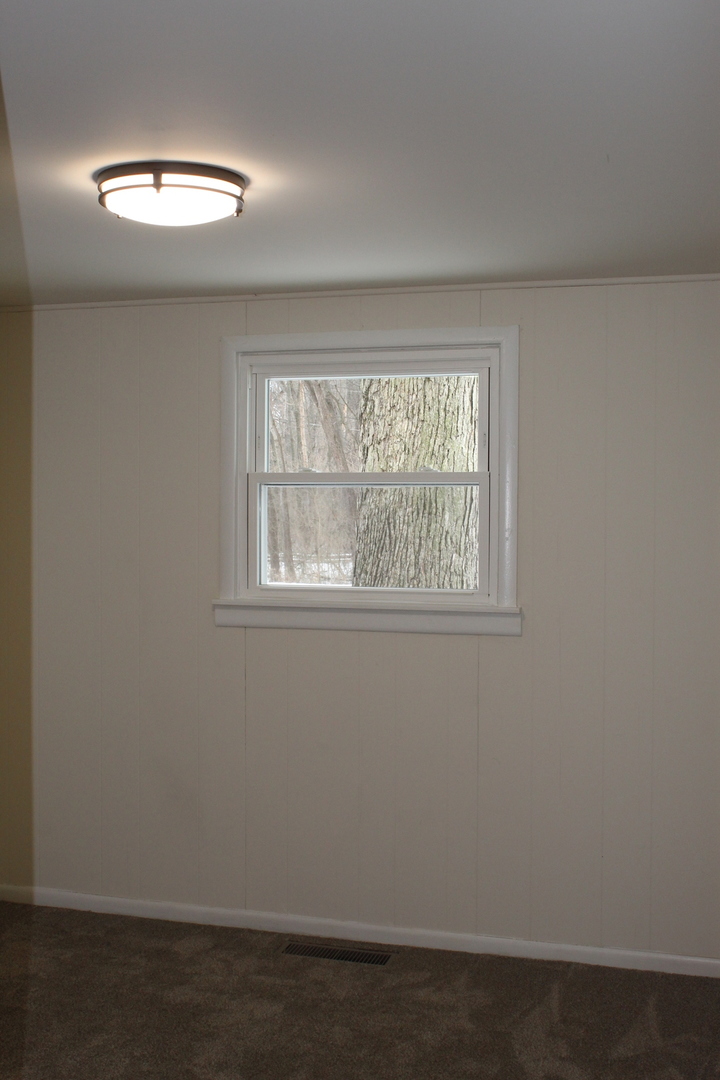 324 Sumac Street Wilmington, IL 60481 - Photo 19 of 23 an empty room with a window