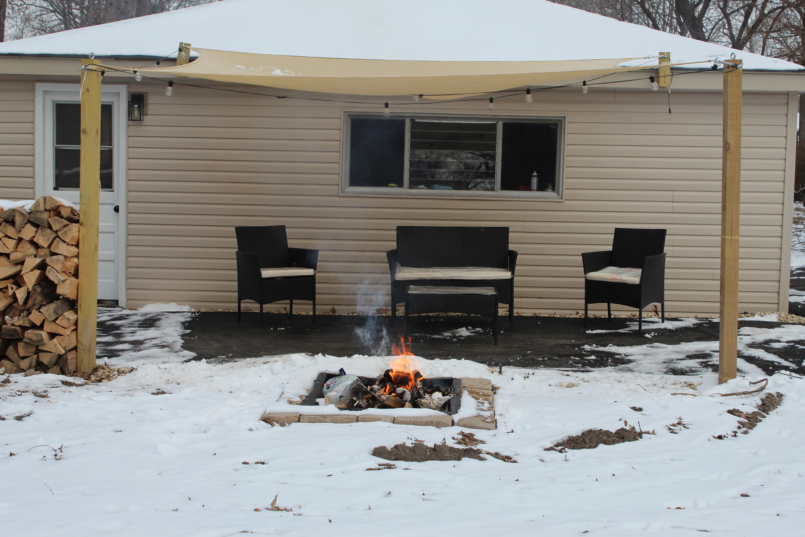 324 Sumac Street Wilmington, IL 60481 - Photo 22 of 23 a view of a house with a yard and garage