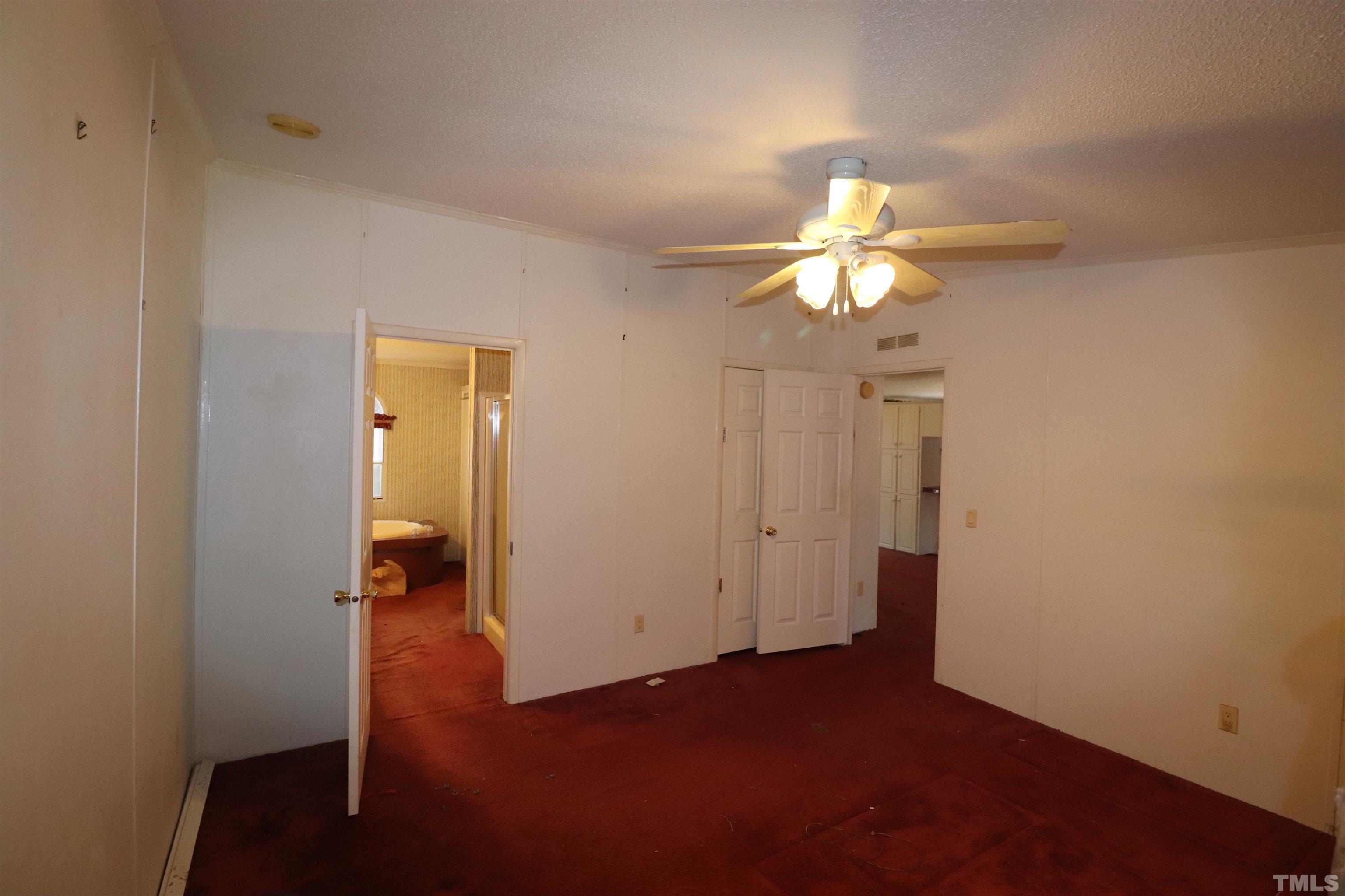 12405 Selma Road Middlesex, NC 27557 - Photo 14 of 22 wooden floor in an empty room with a window
