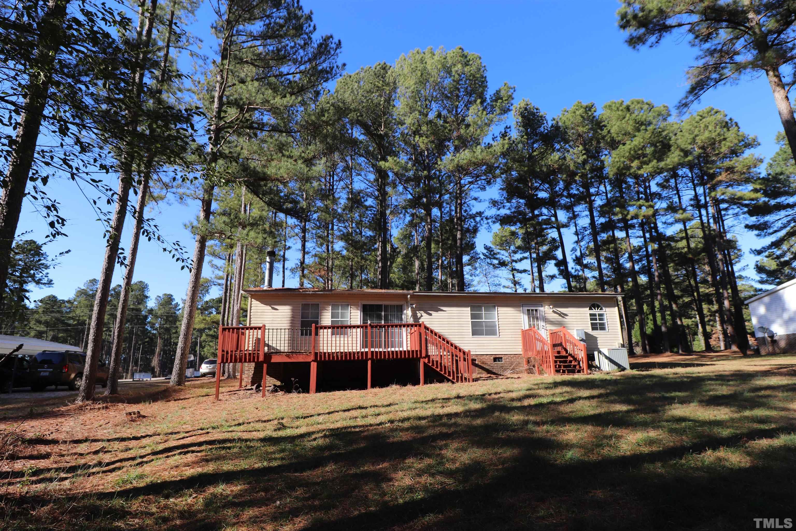 12405 Selma Road Middlesex, NC 27557 - Photo 5 of 22 a view of outdoor space with trees