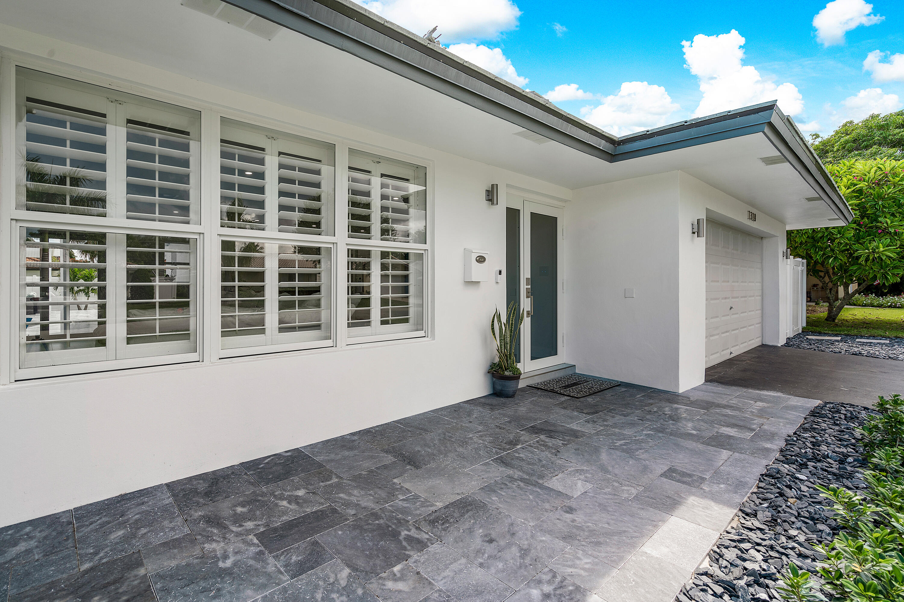 1318 Southwest 13th Drive Boca Raton, FL 33486 - Photo 1 of 32 Front