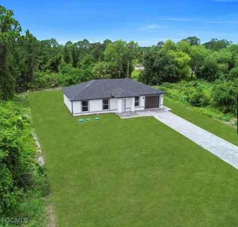 a view of a house with a big yard