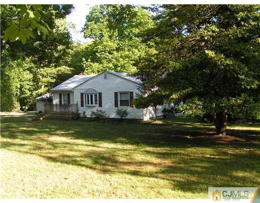 104 Pleasant Valley Road Old Bridge, NJ 08857 - Photo 1 of 7 a view of a house with a swimming pool