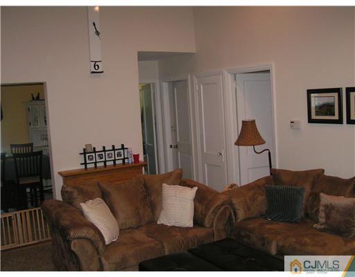 104 Pleasant Valley Road Old Bridge, NJ 08857 - Photo 3 of 7 a living room with furniture