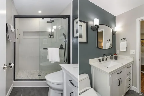 a bathroom with a toilet sink and shower