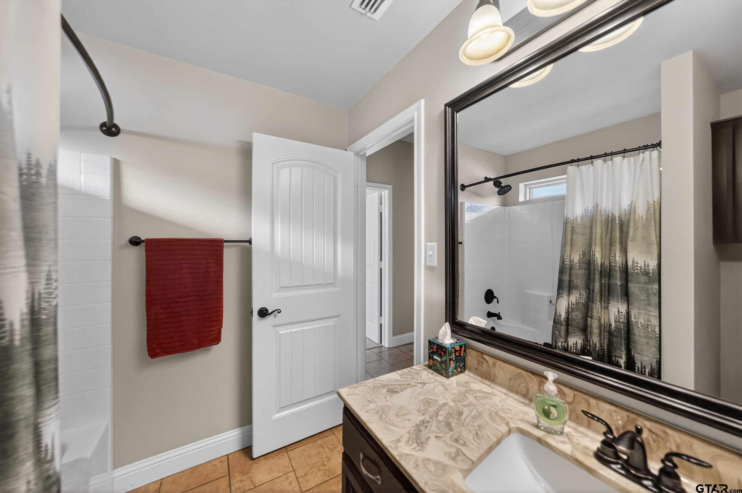 5830 Thompson Place Tyler, TX 75707 - Photo 29 of 35 a room with gym equipment