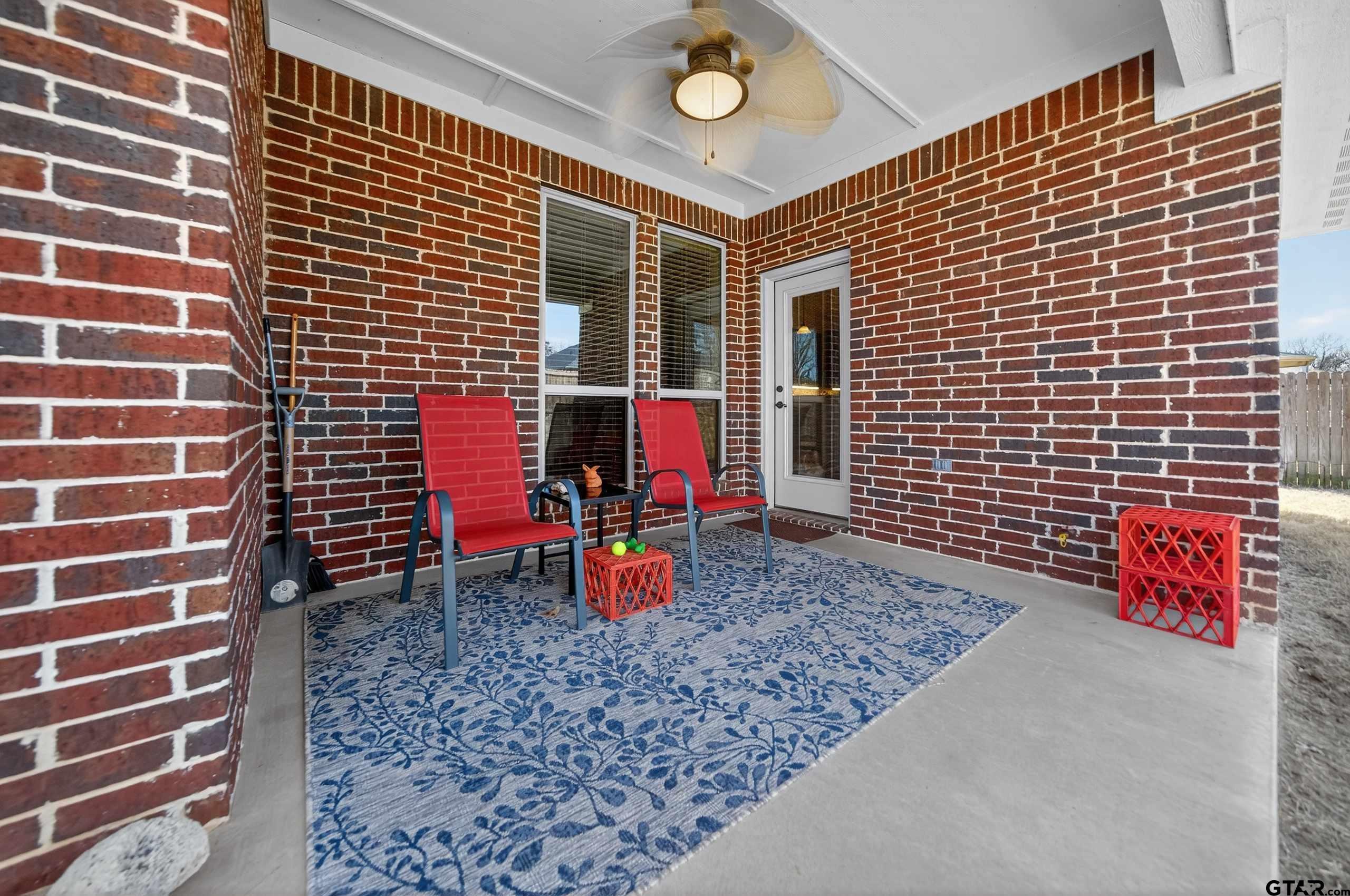 5830 Thompson Place Tyler, TX 75707 - Photo 35 of 35 a backyard of a house with seating space
