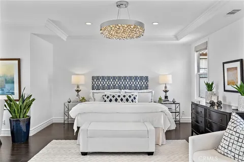 a bathroom with a bathtub shower sink vanity and toilet