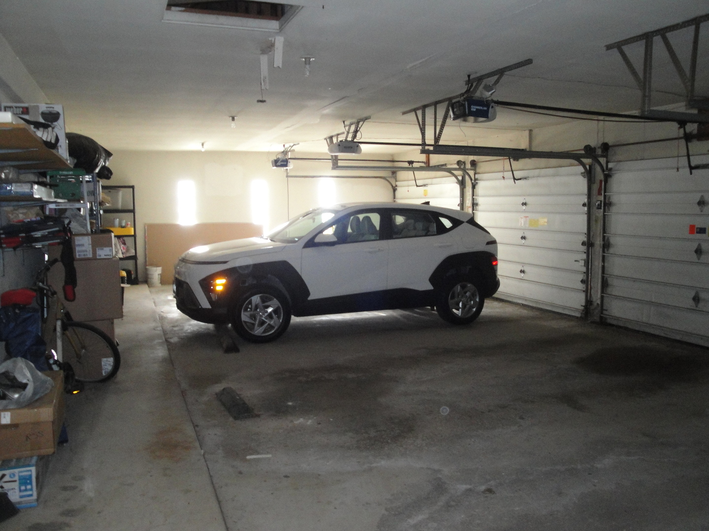 5008 West 122nd Street, Unit 1A Alsip, IL 60803 - Photo 24 of 28 a car parked in a garage