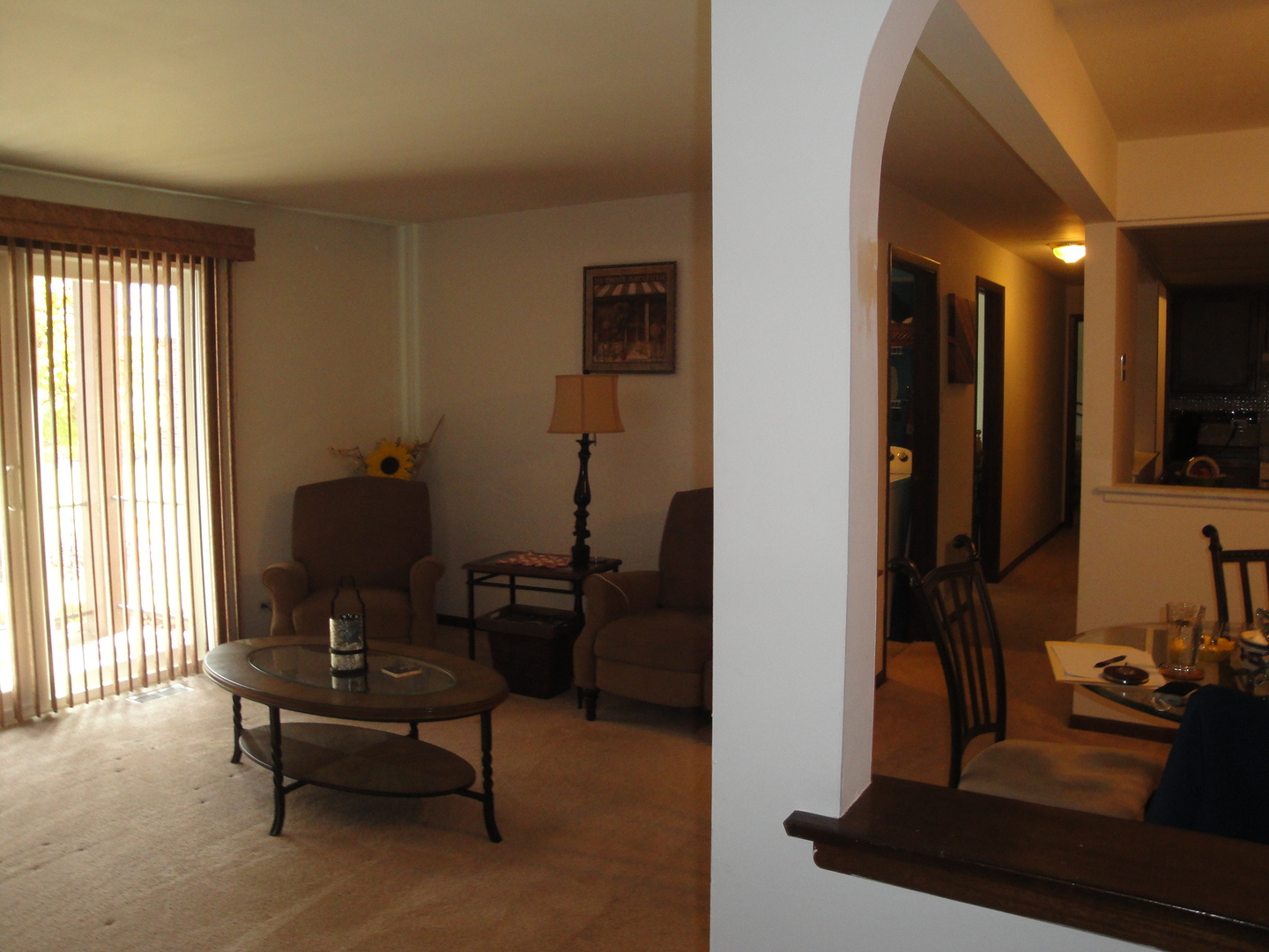 5008 West 122nd Street, Unit 1A Alsip, IL 60803 - Photo 5 of 28 a living room with furniture and a window