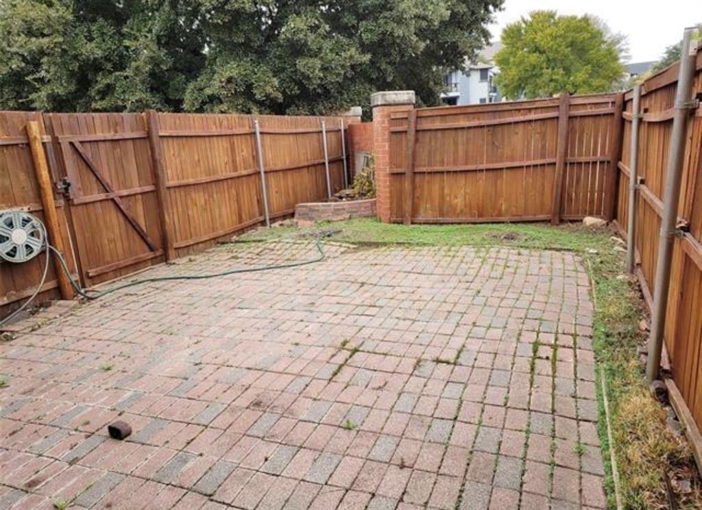 211 Moss Hill Road Irving, TX 75063 - Photo 12 of 14 View of fenced backyard