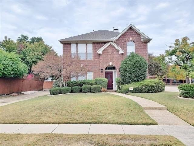 211 Moss Hill Road Irving, TX 75063 - Photo 2 of 14 Traditional-style home with brick siding