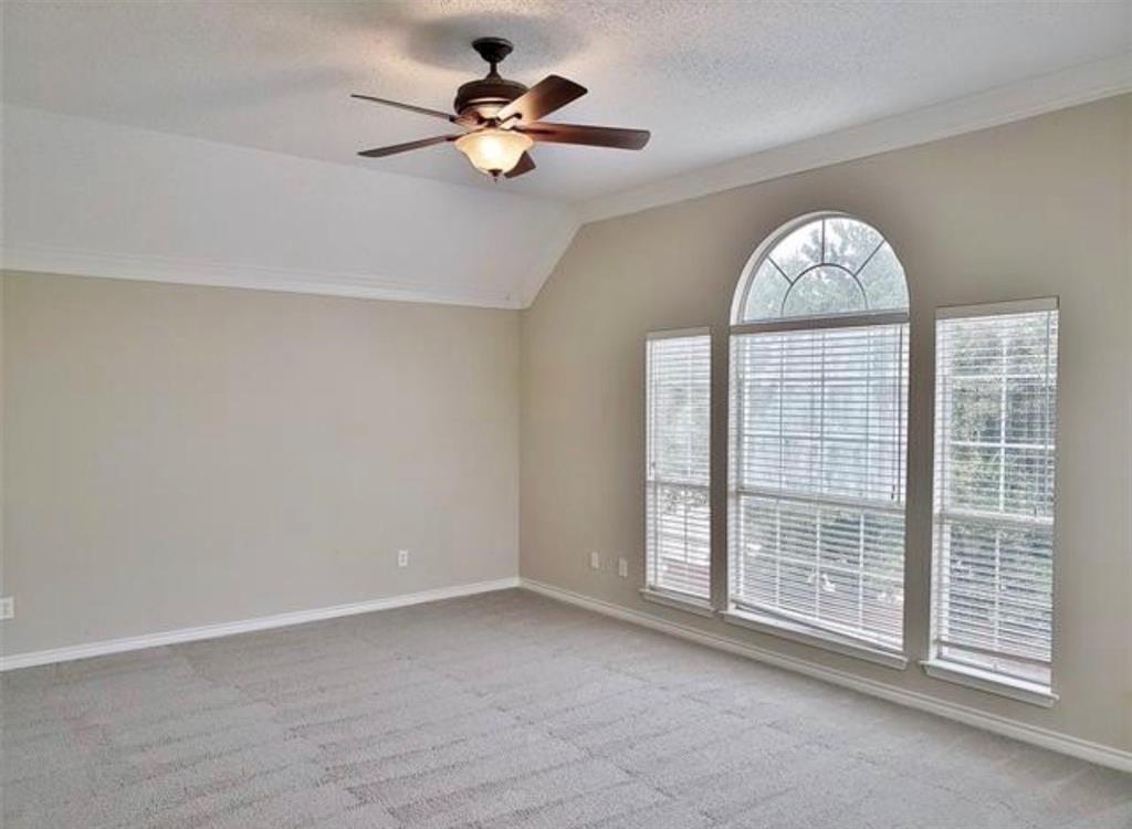 211 Moss Hill Road Irving, TX 75063 - Photo 10 of 14 Spare room with ceiling fan and light carpet
