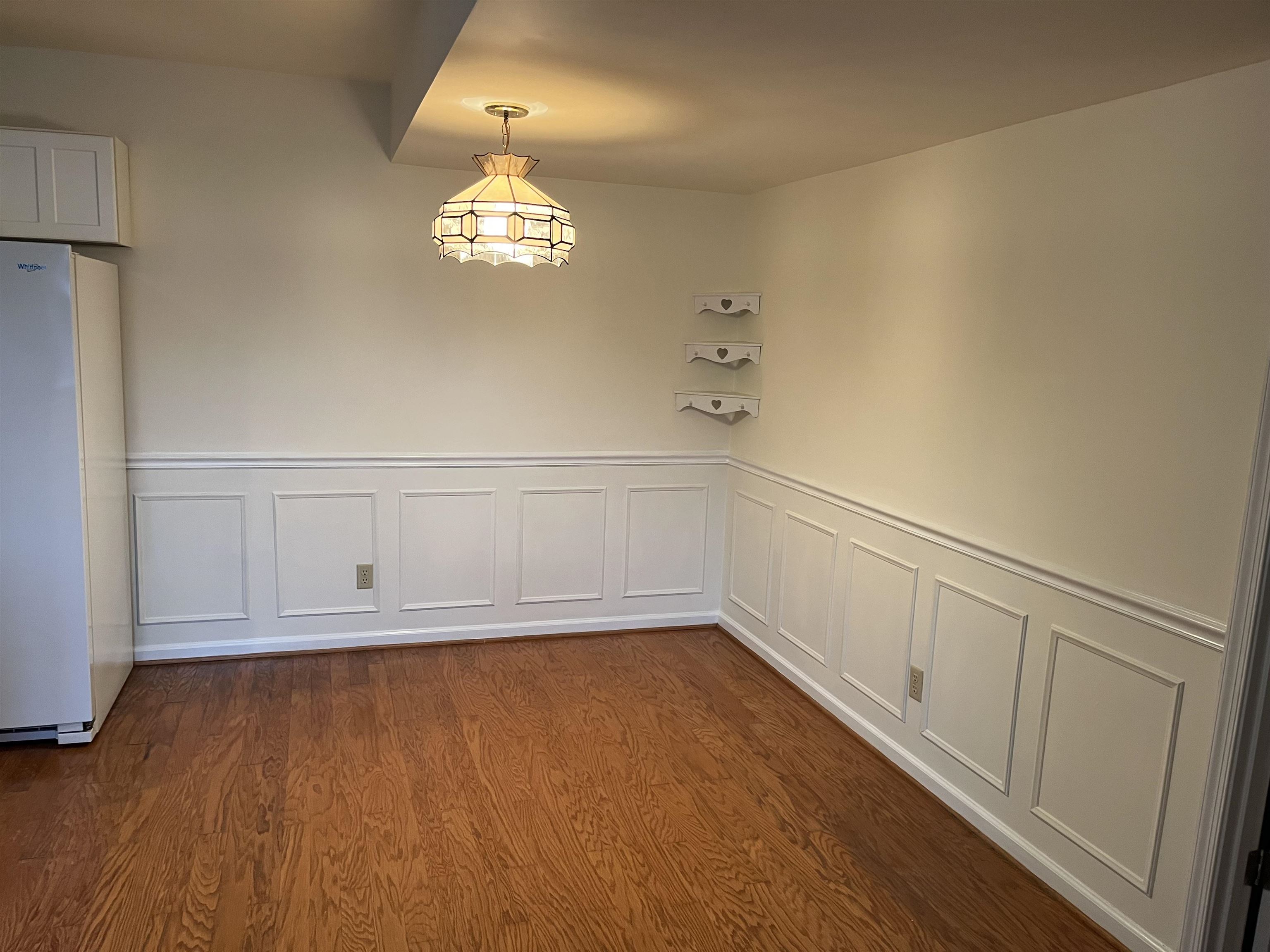 1235 Clover Ridge Place Charlottesville, VA 22901 - Photo 8 of 18 a view of an empty room with wooden floor