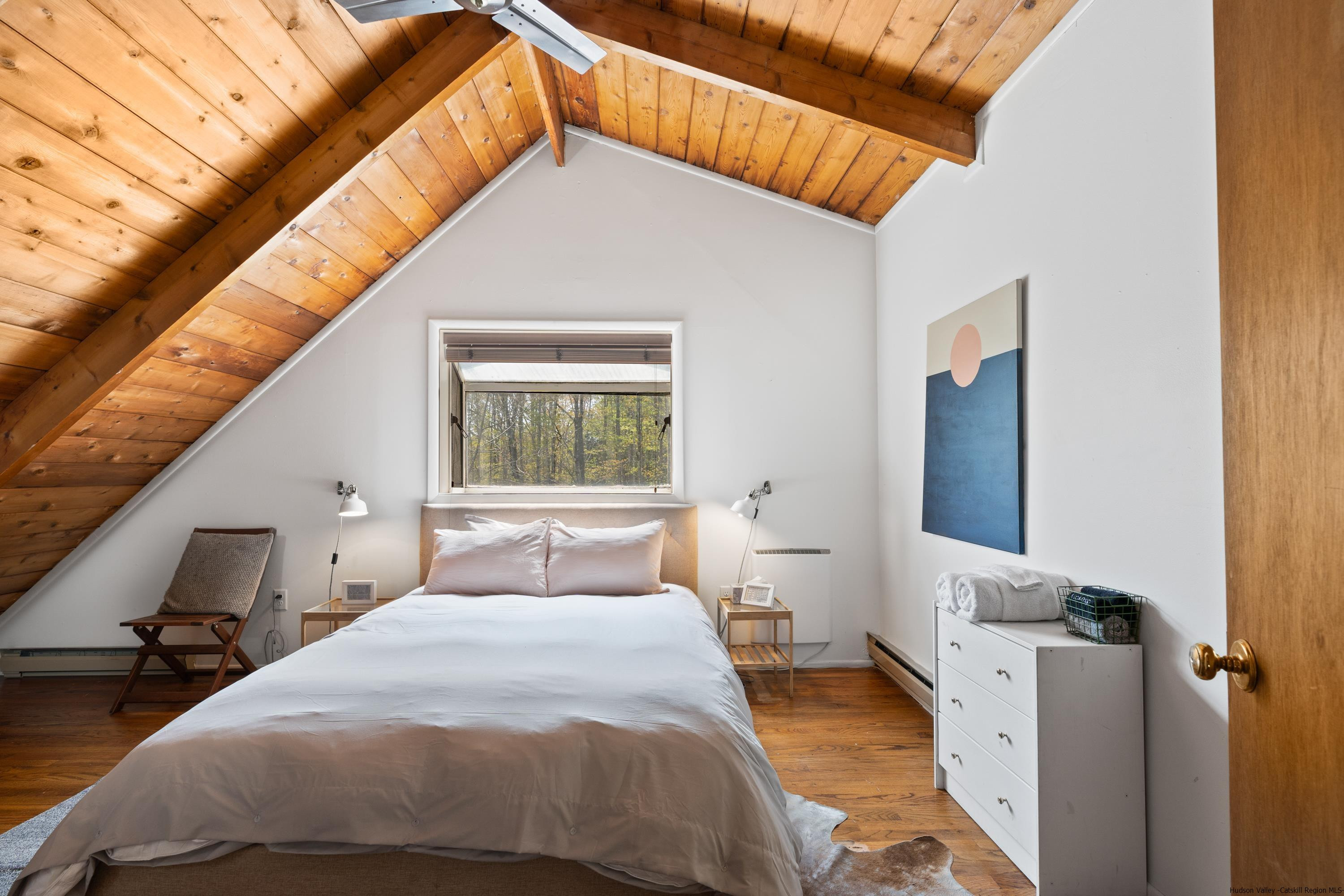 167 Old Towne Road Roxbury, NY 12421 - Photo 19 of 29 a bedroom with a bed and flat screen tv